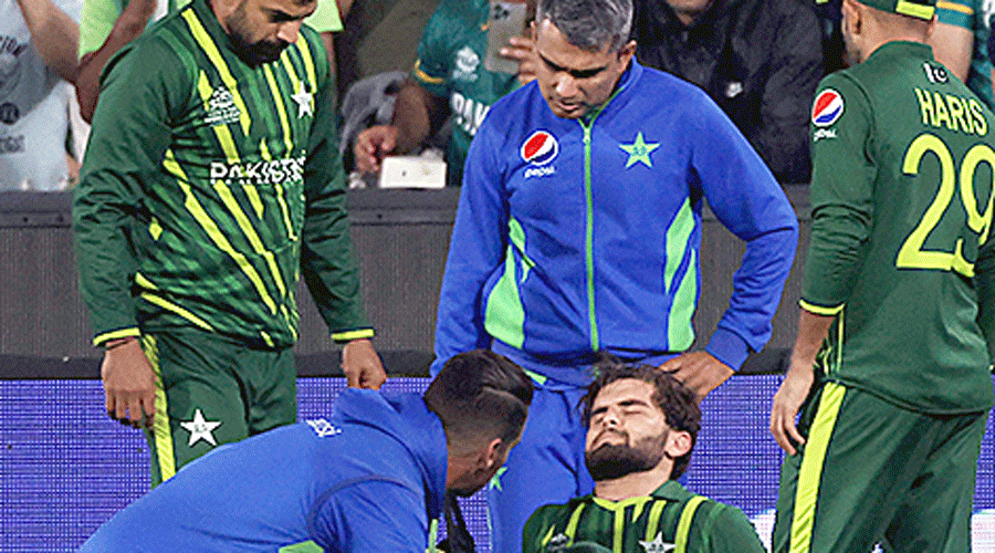 Shaheen Shah Afridi, after sustaining an injury while taking the catch of Harry Brook at the MCG on Sunday.
