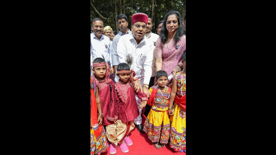 Karnataka Governor Thaawarchand Gehlot poses for photos with children, at Cubbon Park in Bangalore. 