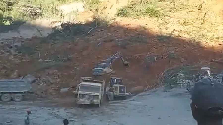 Twelve people were confirmed to have been trapped after the stone quarry caved in at Maudarh village, about 23 km from Hnahthial town, on Monday.