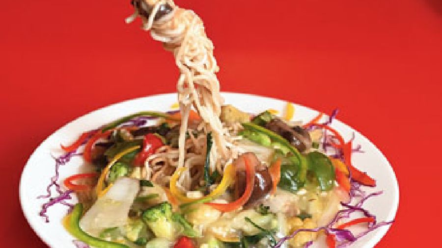 Tangra style pan-fried Cantonese noodles with assorted veggies is filling and has crispy noodles and crunchy veggies