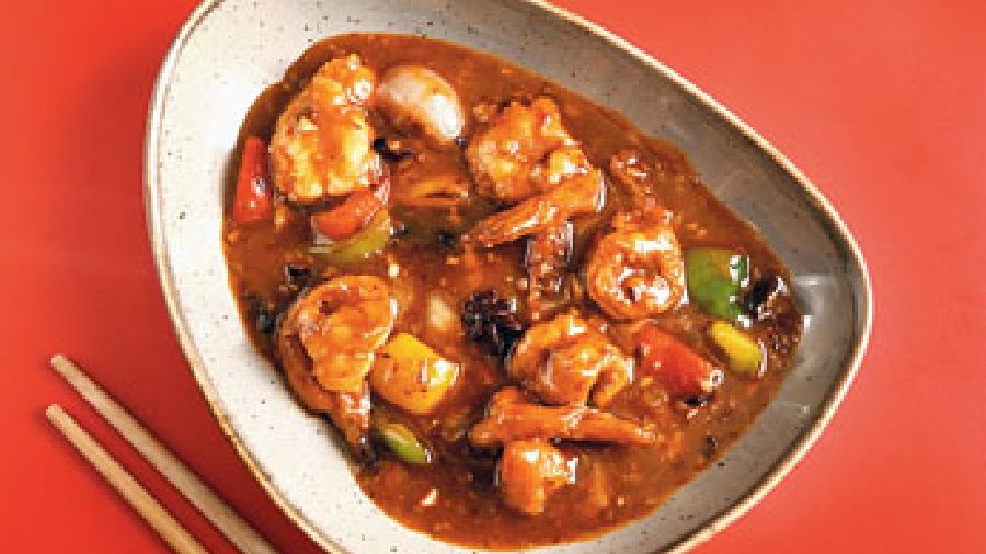 Gong Bao Prawns which is slightly spicy, has a star anise flavour, and is made with cashew, onion and capsicum