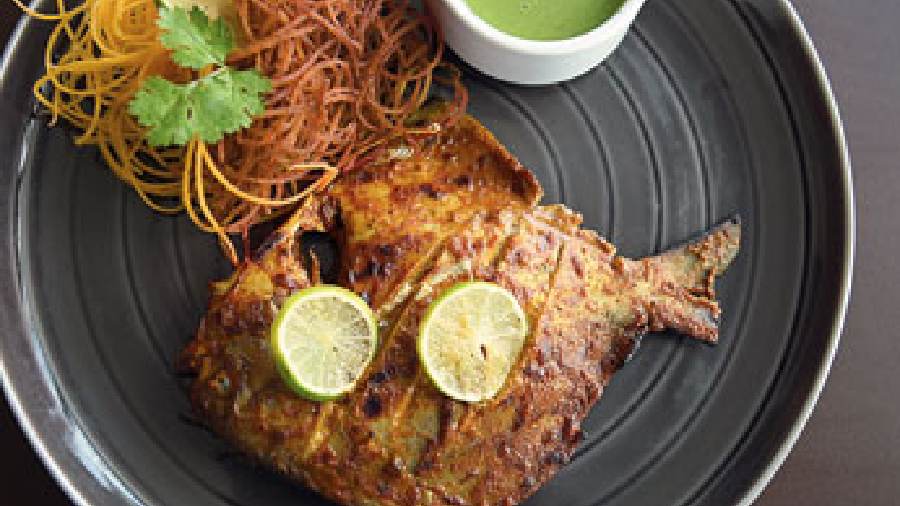 Cooked in tandoori style, Charcoal Pomfret makes for a filling appetiser. This diamond-shaped shiny fish was well-marinated, lending a great flavour on the plate.  
