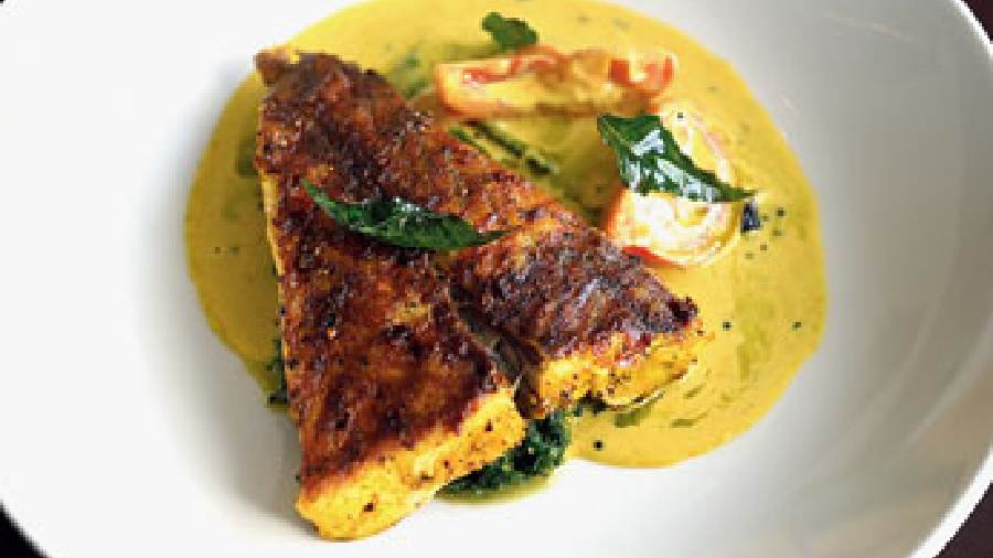 This chunky slab of bekti impressed our taste buds with its crispy texture. Served on a bed of spinach and a yellow gravy, Seabass Moilee Kerala Christian-style is highly recommended.