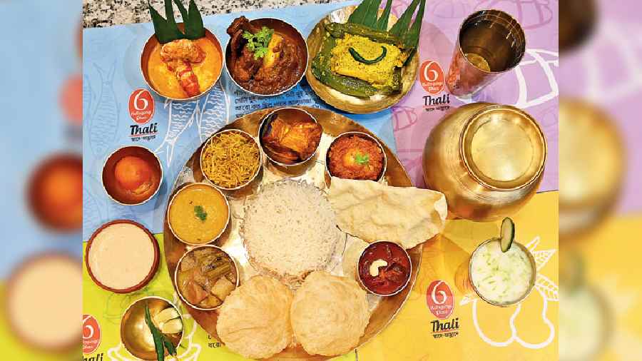 The mouth- watering non-veg  thali named Golpo Holeo Shotti includes favourites like Bhetki Paturi, Kosha Mangsho, Chingrir Malai Curry, Sada Bhaat, Luchi, Shukto, Doi, Misti and more, served with Doi r Ghol