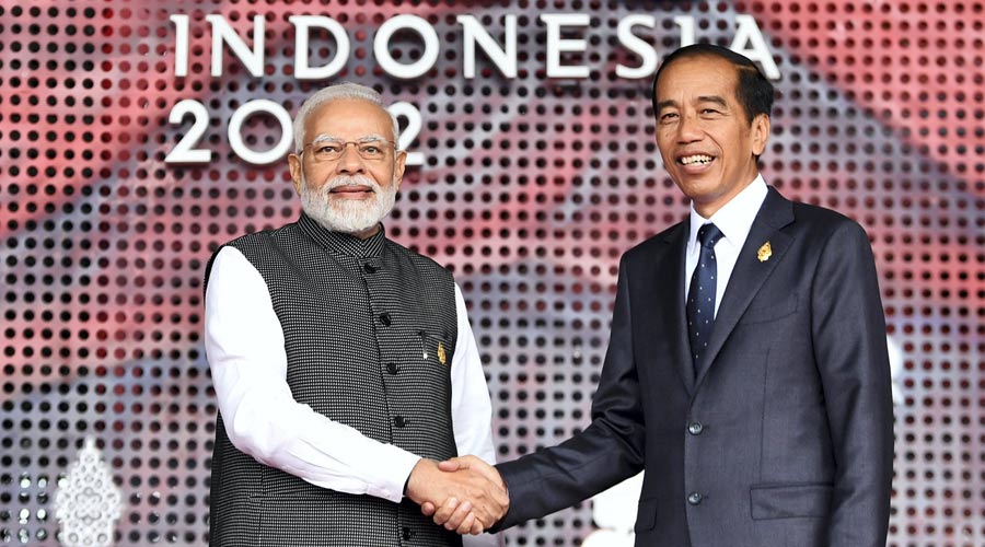 Prime Minister Narendra Modi being welcomed by the President of Indonesia, Joko Widodo for the G20 Summit, in Bali, Indonesia.
