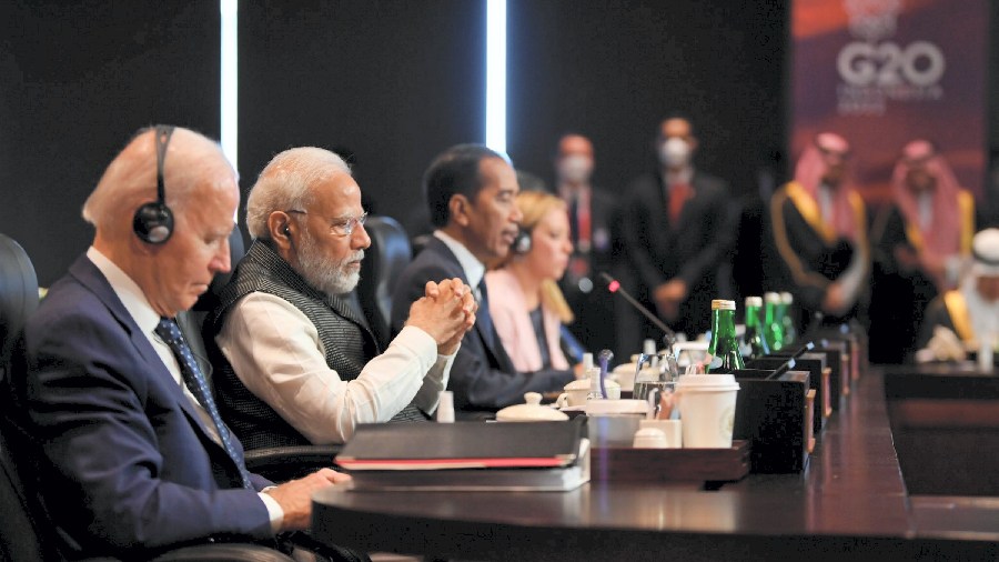 Modi attends a working session on food and energy security at the G20 Summit alongside other world leaders. 
