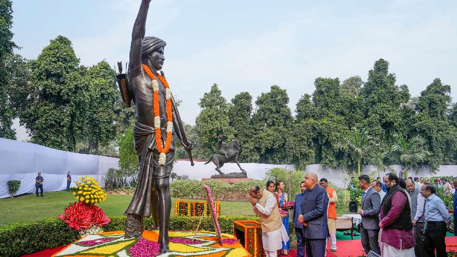Lok Sabha Speaker Om Birla pays tribute to freedom fighter Birsa Munda at Parliament House complex in New Delhi. 
