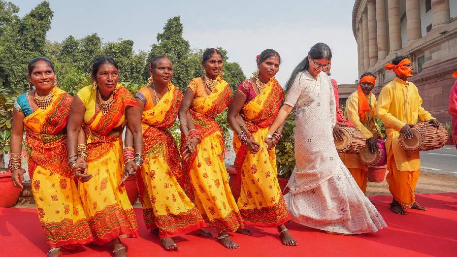 Union MoS for Commerce and Industry Anupriya Patel dances with folk artists after paying tribute to freedom fighter Birsa Munda.