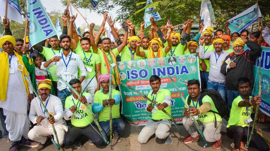 Members of Indigenous Student Organization (ISO) India during a demonstration on the occasion of birth anniversary of freedom fighter Birsa Munda, in Patna. 