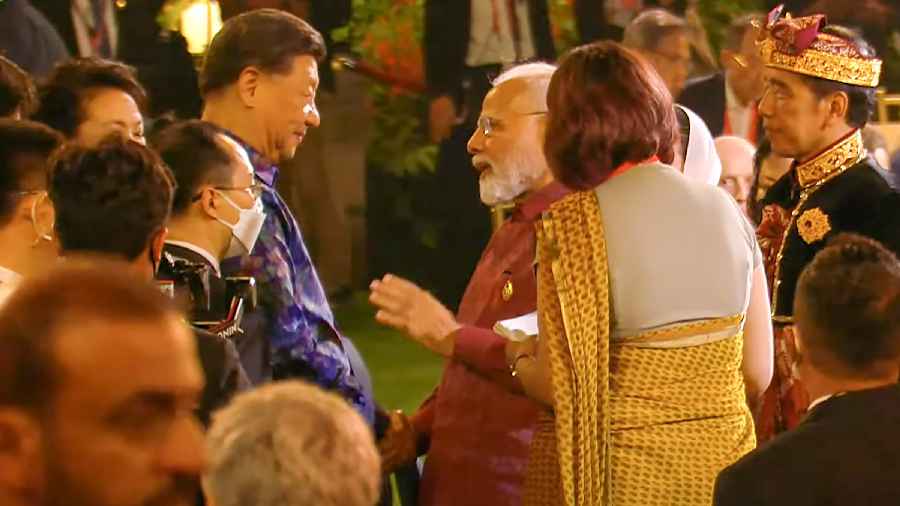 India's Prime Minister Narendra Modi with Chinese President Xi Jinping at the Welcoming Dinner during G20 Leaders' Summit, at Garuda Wisnu Kencana Cultural Park, in Bali
