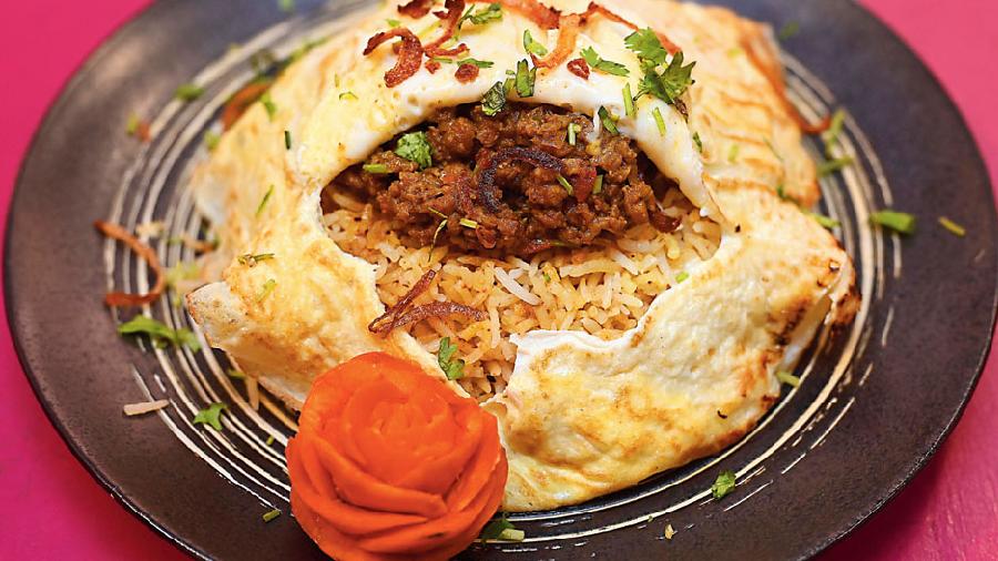 Potlam Mutton Keema Biryani: This minced mutton biryani is wrapped in egg. Thus the name! Cooked in Hyderabadi style, this unique biryani is garnished with sauteed onions.