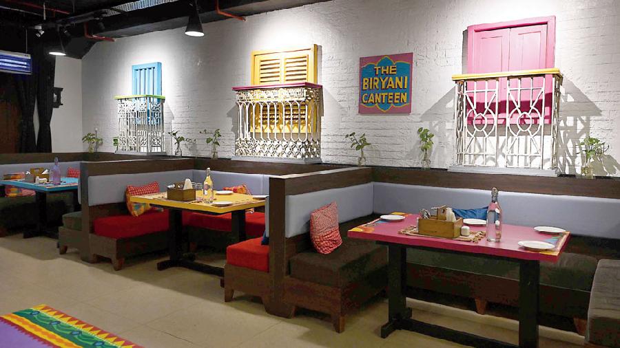 This interiors are an ode to Kolkata. The windows have a distinct North Kolkata feel. We loved these funky ones inside the restaurant. There are numerous phrases painted on the walls, in addition to the colourful tables and chairs.