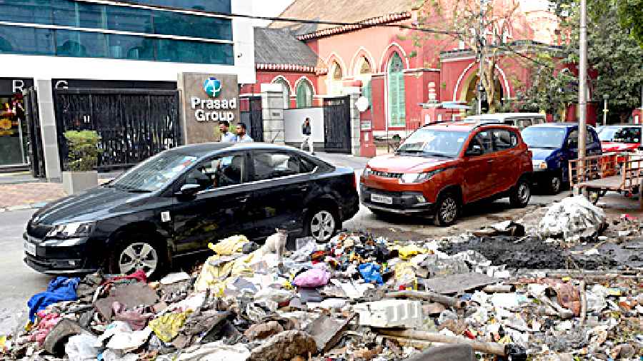 Garbage on the same footpath on Sudder Street on Monday