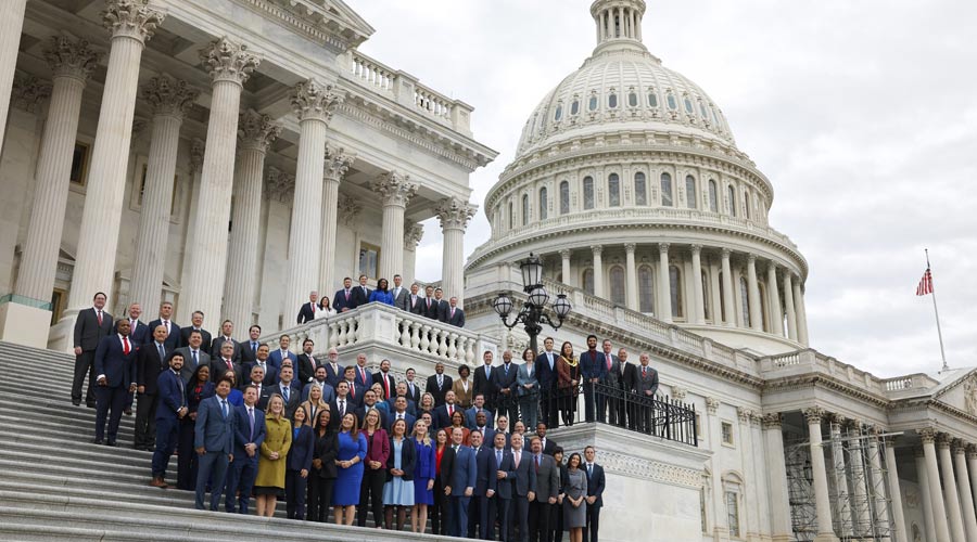 Members-Elect of the 118th Congress take a group photo on the House steps, on Capitol Hill in Washington on Tuesday.