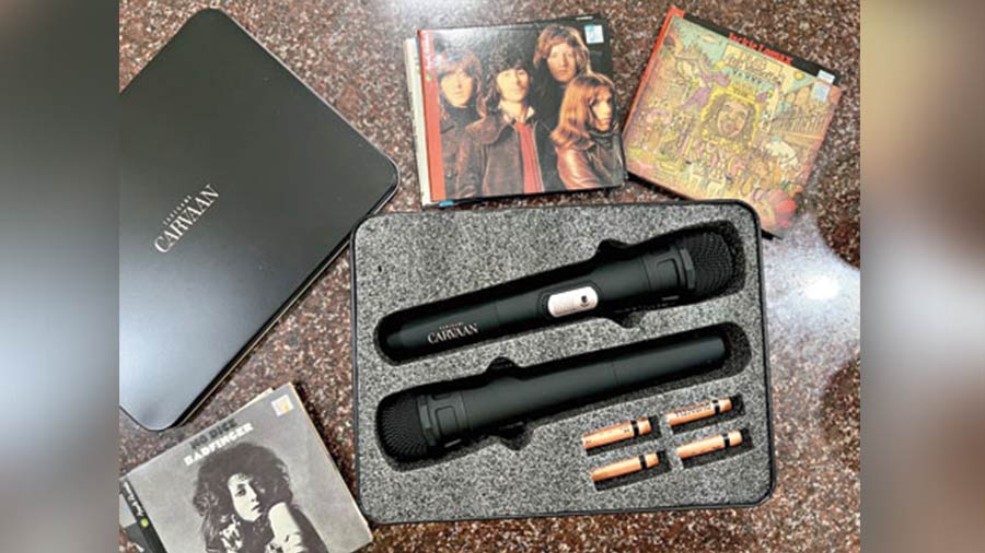 The karaoke microphones come in a well-designed metallic box
