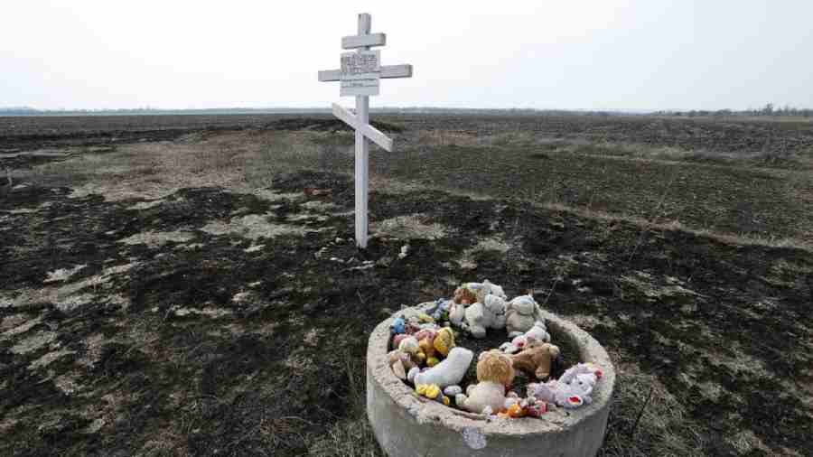 Toys are placed in the memory of victims of the Malaysia Airlines Flight MH17 in the village of Rozsypne, Donetsk region of Ukraine. 