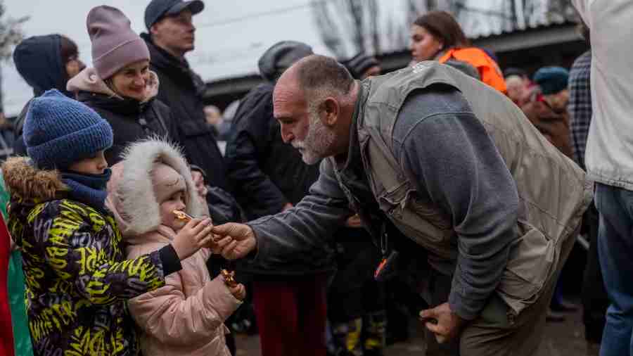 Spanish-American chef Jose Andres, founder of the World Central Kitchen, gives food to residents in Kherson, southern Ukraine, on Thursday. 