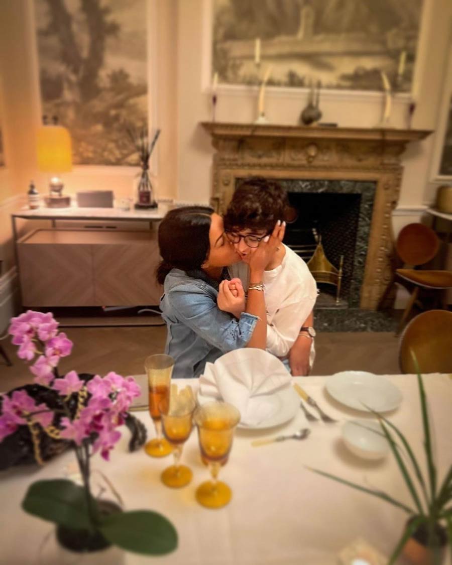 The birthday girl never fails to show her love, even for her friend's kids. 