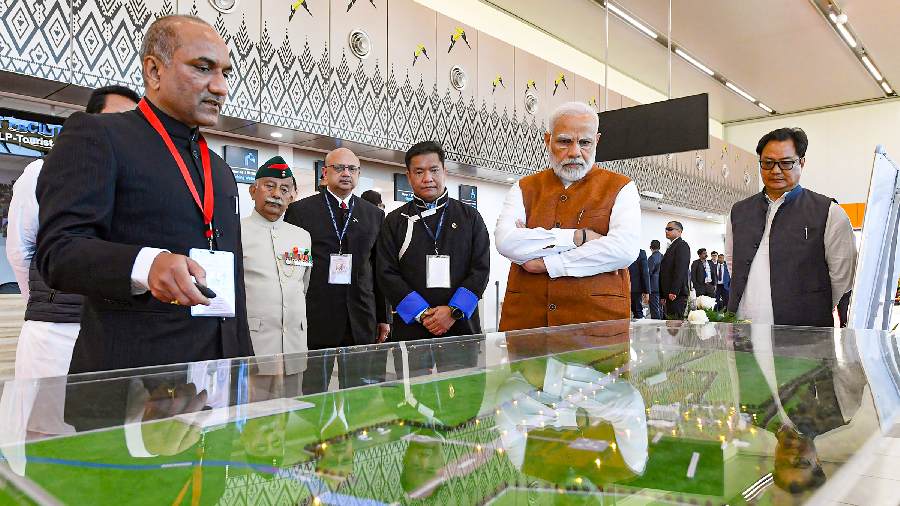 PM with Kiren Rijiju and Arunachal Pradesh CM Pema Khandu. The airport's foundation stone was laid by Modi on February 2019. 