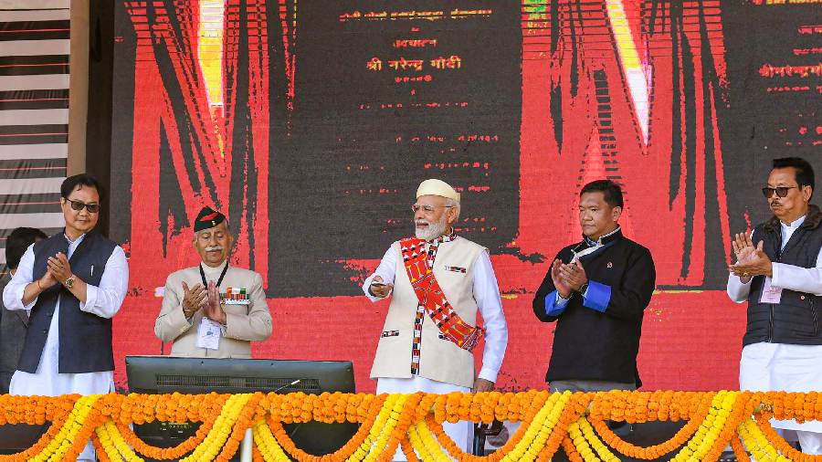 PM Modi with Arunachal Pradesh Governor Brig. B. D. Mishra (retd.), Kiren Rijiju and Pema Khandu during the inauguration of the states's first greenfield airport. 