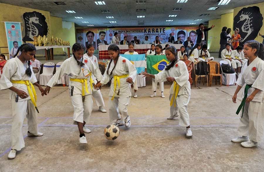 Karate students show their support for Brazil and Argentina by holding up flags of the countries at Jadavpur University on Sunday, November 20 — the first day of the FIFA World Cup 2022