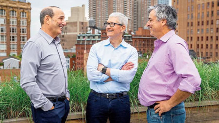 Major League Soccer commissioner Don Garber (left), Apple CEO Tim Cook (centre) and Apple senior vice-president of services Eddy Cue