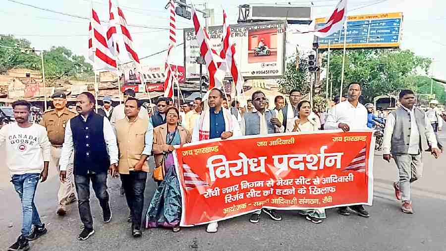 Tribal organisations march towards the office of the state election commission in Ranchi on Friday.