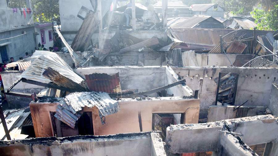 The remains of the houses burnt in Saturday’s blaze in Siliguri. 
