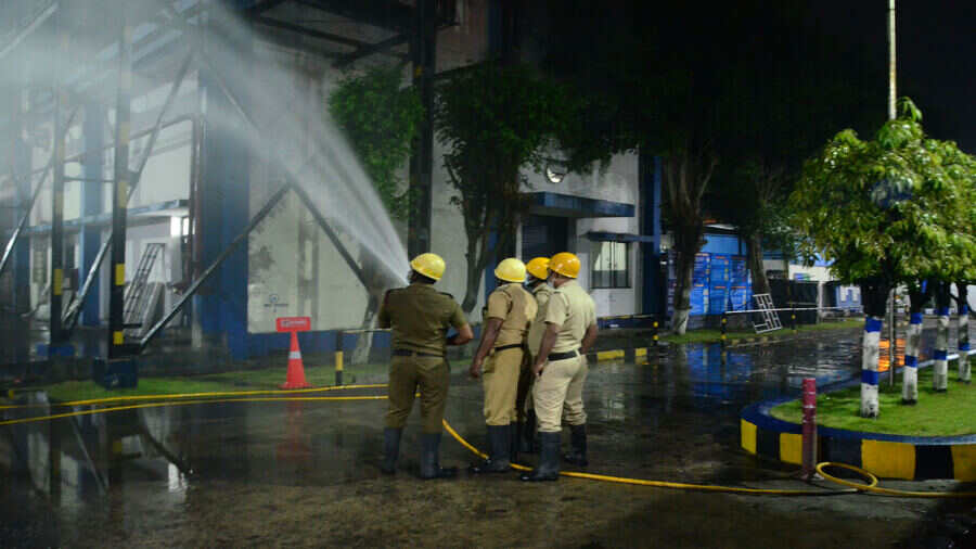 Firemen fight the blaze at the soft drink bottling plant in Kamalgazi on Monday evening. 