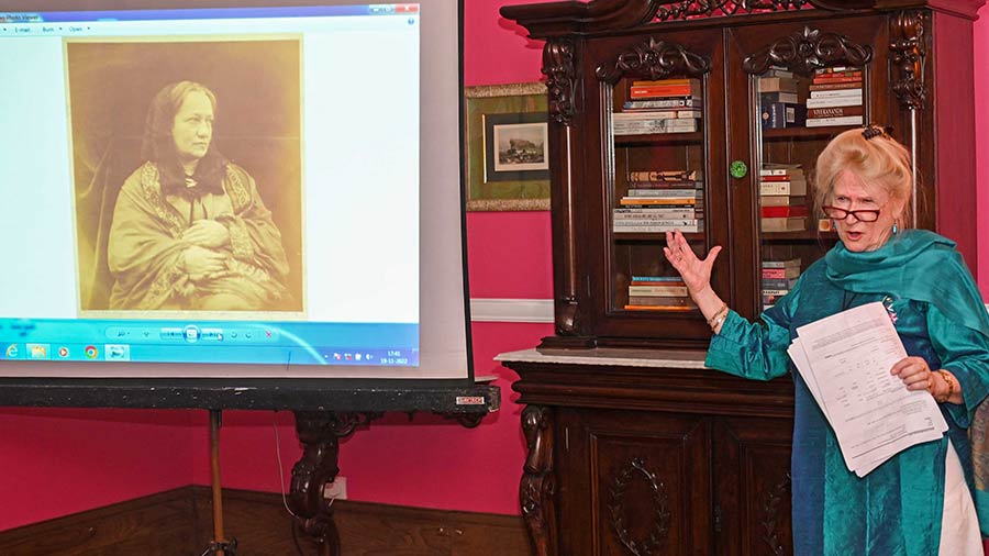 Jane Richter displays a photograph of Julia Margaret Cameron that was taken by her son, Henry Herschel Hay Cameron, who was a professional photographer