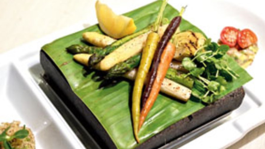 Charred Duo of Asparagus, Roman Artichoke: These exotic veggies are sautéed till tender on the inside and crispy outside and then served on hot-stone plates that keep the food warm on the table for a longer time. Sides such as tangy citrus quinoa and guacamole complement these root veggies