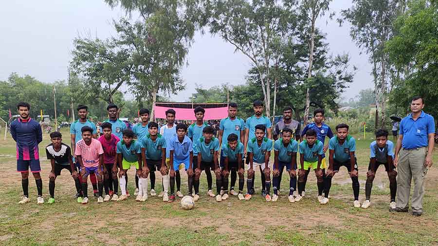 Koushik Ghosh (far right) with members of the Santiniketan Tribal Academy during a tournament in Daronda, Birbhum