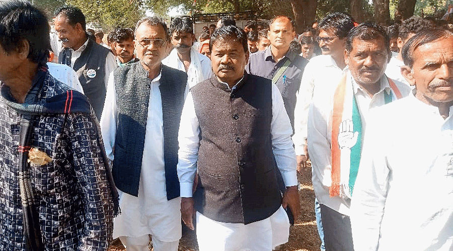Bandhu Tirkey (centre) campaigns for the Congress candidate at Chottaudepur in Gujarat.