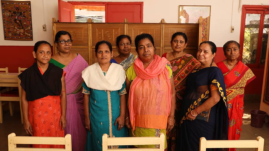 Papiya Choudhury (right), the present president of the association and overseer of the entire operations, and some of the ladies who help in holding aloft the torch of women empowerment against all odds