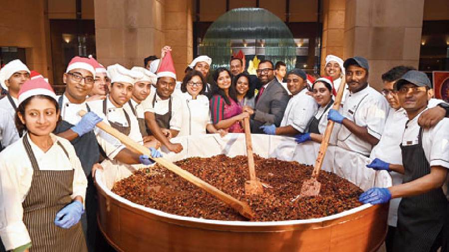 The staff at Hyatt Regency Kolkata with Kumar Shobhan and his wife Anumita Ghosh (in pink). “The timeless tradition of cake mixing is a celebration we look forward to. It harbingers the Yuletide spirit, which is incomplete without the rich and sumptuous Christmas cake. To usher in the festive spirits we gathered with our guests and team for the ceremony to contribute towards the mixing of ingredients. This cake-mixing ceremony not only infuses fruits and wines, but also reaps in Christmas cheer. The first bake will be distributed among the partnered NGO to welcome the festive season,” said Kumar Shobhan, general manager, Hyatt Regency Kolkata