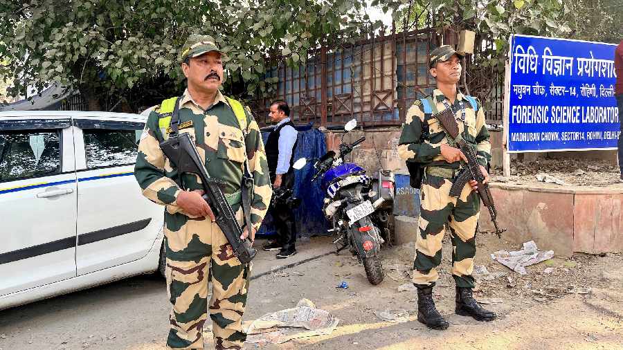 Border Security Force personnel deployed outside Forensic Science Laboratory (FSL) after an attack on a police van carrying Aaftab Amin Poonawalla, accused in the Mehrauli murder case, on Monday, in New Delhi, Tuesday, November 29, 2022.