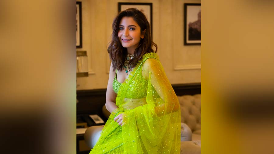A dollop of pop and a few neat pleats: When it comes to wedding fashion, you ought to go all out and look your best. Move over what-has-been-done-before and opt for an Anushka Sharma-inspired neon transparent sari, with pleated borders adding a little twist. Wear a matching noodle-strap blouse or go for a full-sleeved one with plunging neckline, because it’s winter after all.