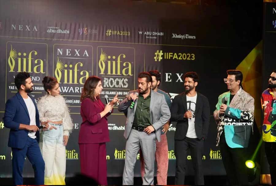 Farah Khan and Salman Khan engage in a fun banter on stage at the IIFA press conference.