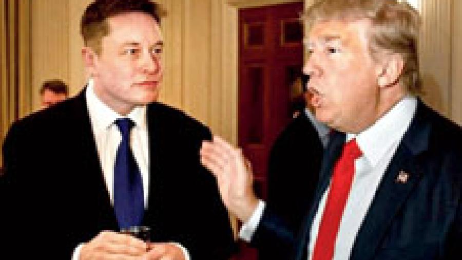 File picture of Elon Musk with former US President Donald Trump