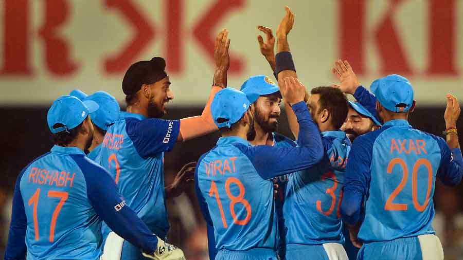Indian players celebrate fall of a South African wicket