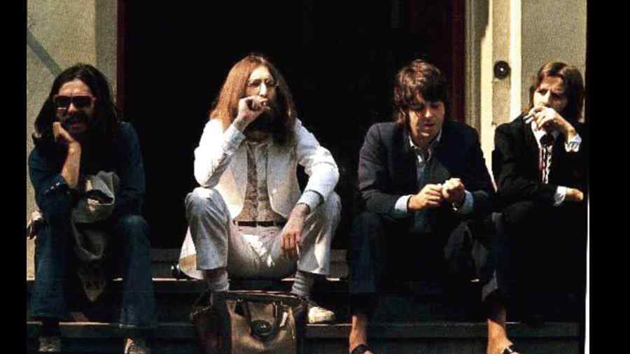The Beatles waiting to cross Abbey Road on August 8, 1969
