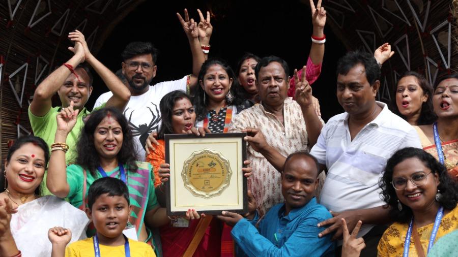 Members of Pally Unnayan Samity celebrate their win
