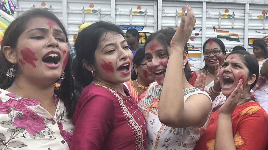 Young girls during immersion of Devi Durga in Calcutta on Wednesday