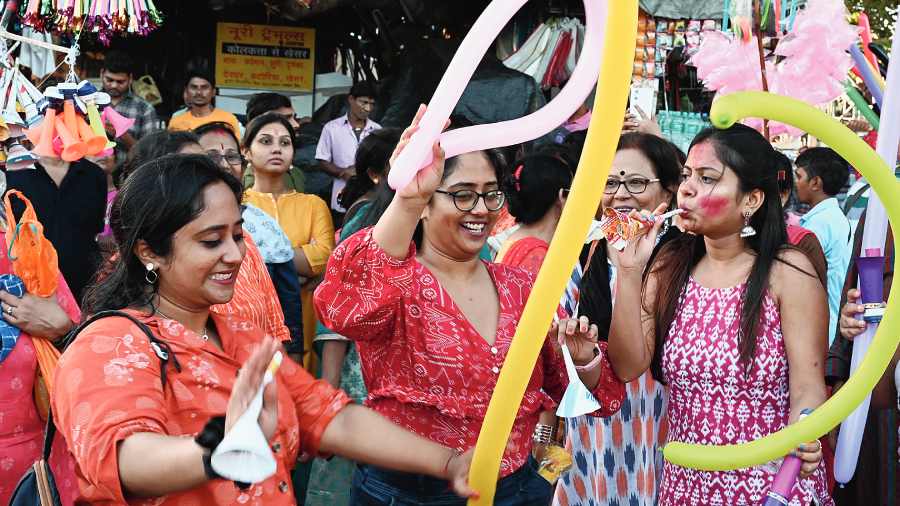 Revellers at the ghat.