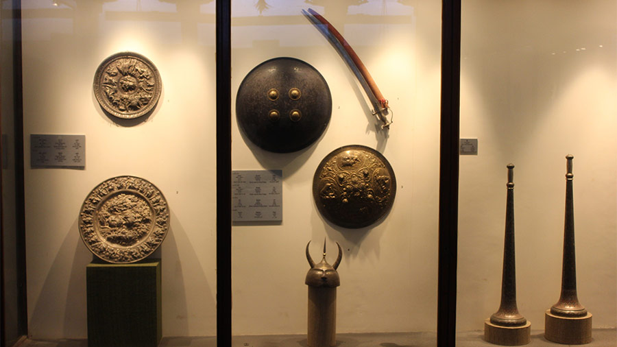 The decorative items section houses priceless antiques that include swords, shields and ancient helmets