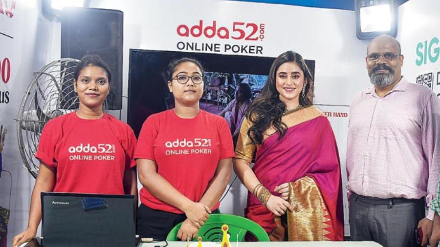 Ridhima and CEO of adda52.com Shivanandan Pare at the online poker stall installed along with pandal.