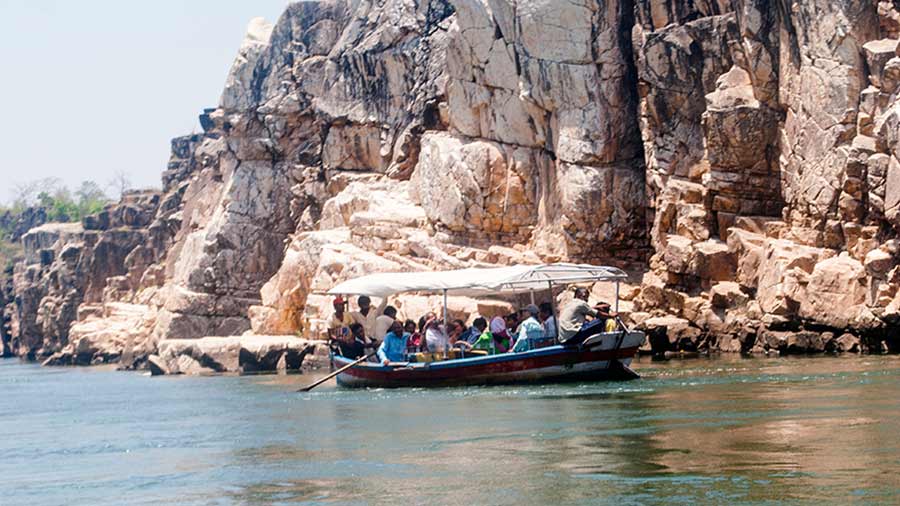 Enjoy a boat ride around the Marble Rocks in Jabalpur