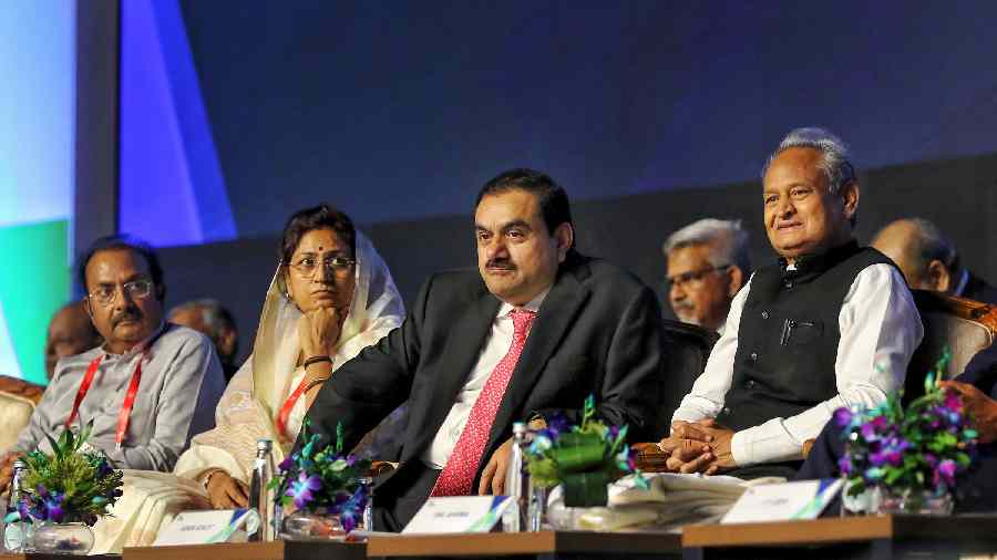Rajashtan CM Ashok Gehlot, Adani Group Chairman Gautam Adani and Congress leader Shakuntala Rawat during the Invest Rajasthan Summit 2022 in Jaipur on Friday. The Chief Minister also launched state's first Non-Resident Rajasthani (NRR) policy