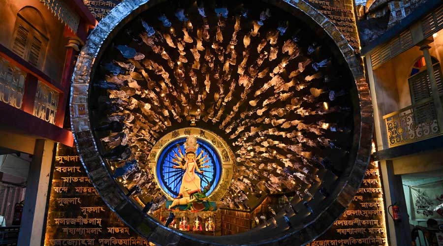  An idol of Goddess Durga at a community puja pandal during Durga Puja festival celebrations in Calcutta.