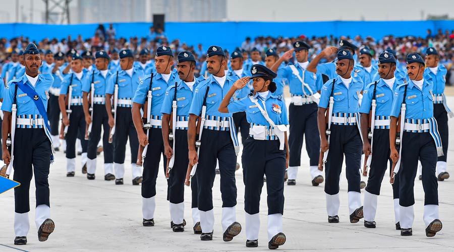 Air Force personnel perform a march-past during 90th anniversary celebrations of Indian Air Force (IAF), at the Air Force Station in Chandigarh